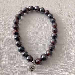 T Jazelle Garnet Stretch Bracelet